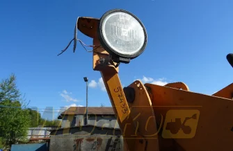Wspornik lampy prawy,przód Case 721D 