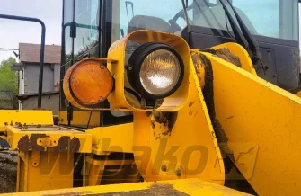 Wspornik lampy prawy,przód do ładowarki Hyundai HL760-7 