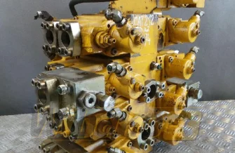 Rozdzielacz Caterpillar 212 M/9